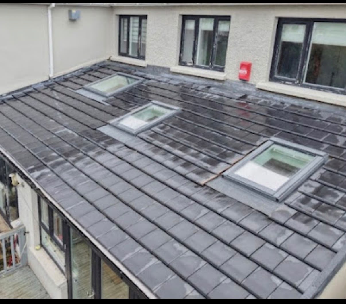Slate pitched roof with Velux skylights installed on a Colchester property, Essex