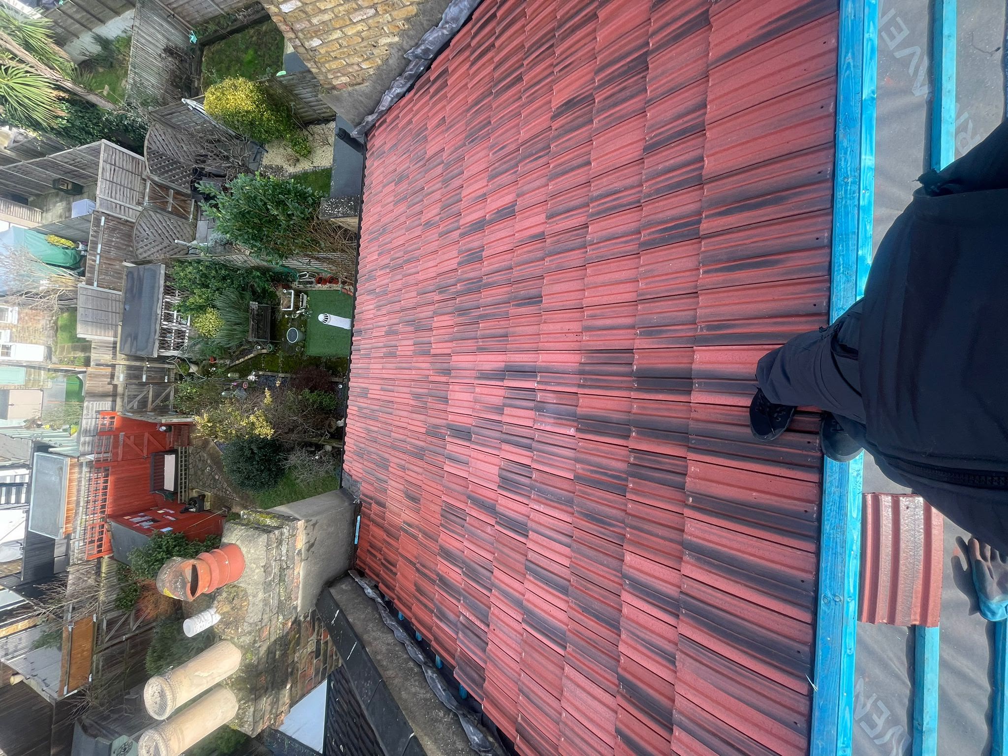 Tiled roof with neatly laid concrete tiles on a property in Colchester, Essex